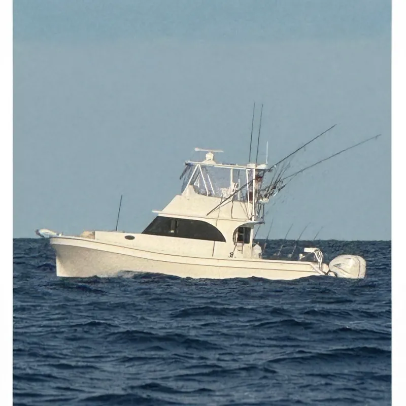 The Image of 2023 Millenium 37 Walk Around Fly Bridge Sportfish on open ocean waters. - 0