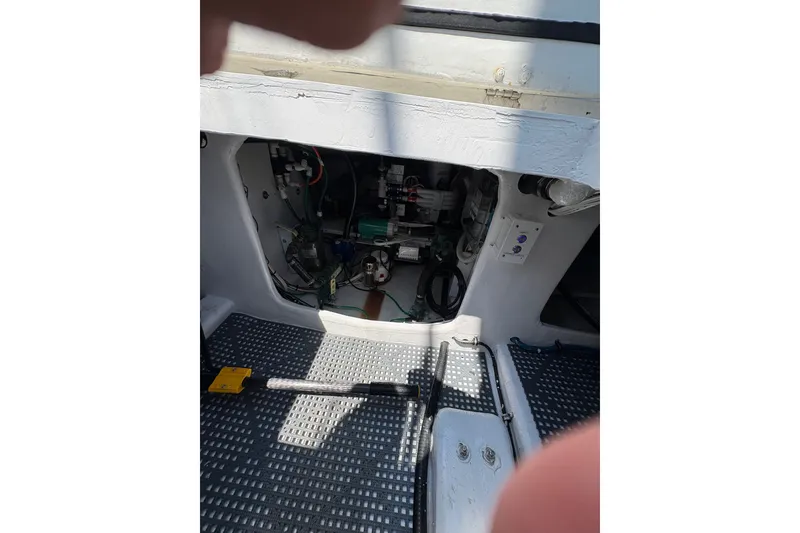 Slide: The Image of Interior view of 2023 Millenium 37 Walk Around Fly Bridge Sportfish boat's engine compartment. - 31