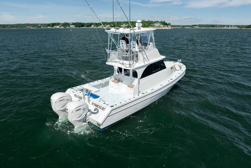 Slide: The Image of 2023 Millennium Marine 37 Walk Around Fly Bridge Sportfish on open water. - 68