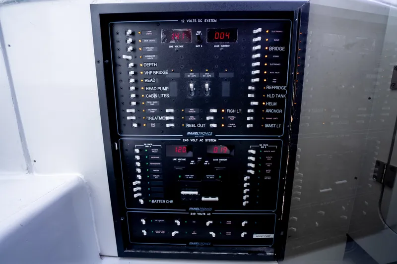 Slide: The Image of Electrical control panel on 2023 Millennium Marine 37 Walk Around Fly Bridge Sportfish boat. - 97