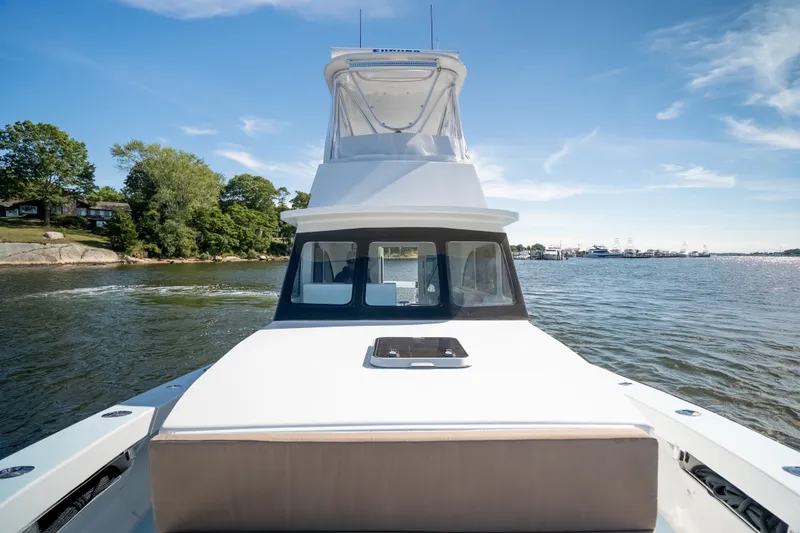 Slide: The Image of 2023 Millennium Marine 37 Walk Around Fly Bridge Sportfish on scenic waterway. - 72