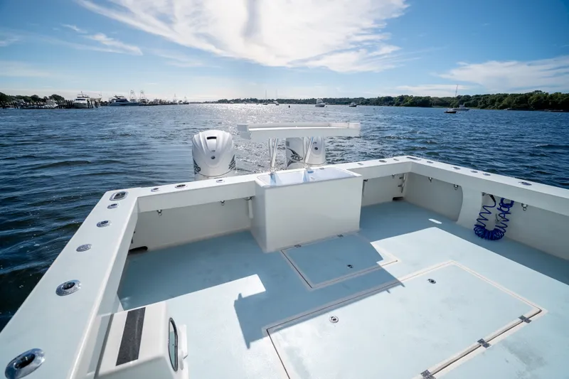 Slide: The Image of 2023 Millennium Marine 37 Walk Around Fly Bridge Sportfish on open water. - 80