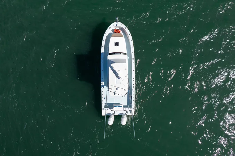 Slide: The Image of Aerial view of 2023 Millennium Marine 37 Walk Around Fly Bridge Sportfish on open water. - 70