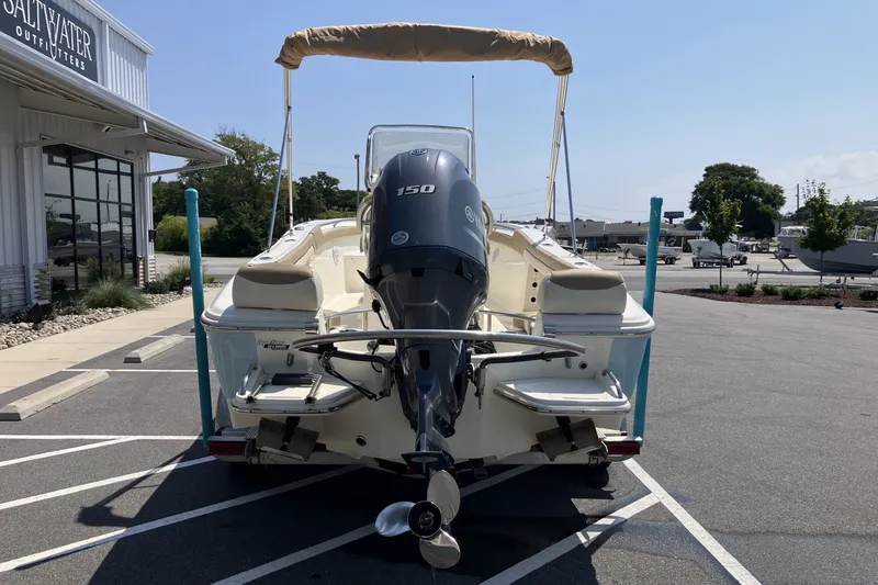 Slide: The Image of 2017 Pioneer 202 Sportfish boat with Yamaha 150 engine, parked outside Saltwater Outfitters. - 6