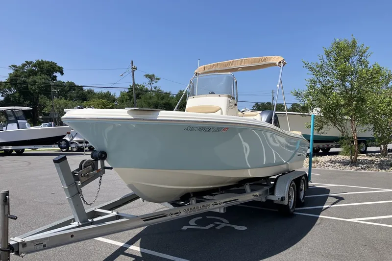 Slide: The Image of 2017 Pioneer 202 Sportfish boat on trailer in sunny parking lot. - 3