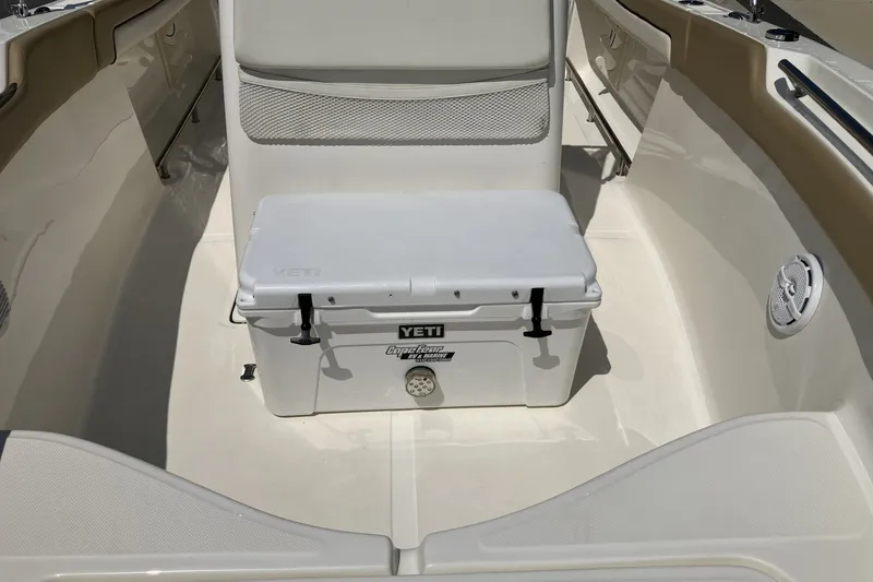 Slide: The Image of 2017 Pioneer 202 Sportfish boat interior with Yeti cooler on deck. - 15