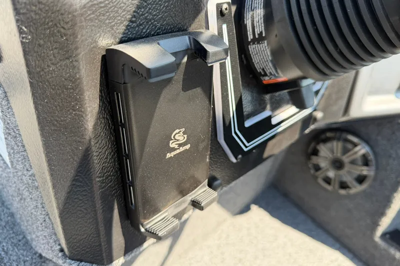 Slide: The Image of Close-up of AquaAmp device on 2027 Lund 1875 Pro-V boat dashboard. - 8
