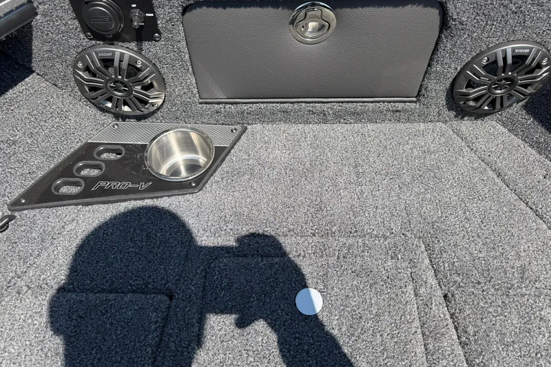 Slide: The Image of Interior of 2027 Lund 1875 Pro-V boat with speakers and cup holder. - 17