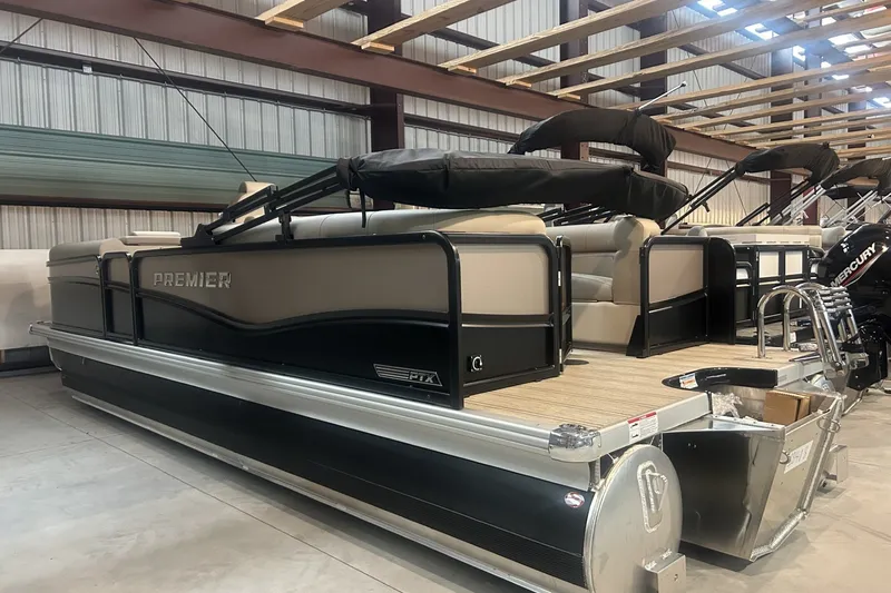 Slide: The Image of 2027 Premier 230 Sunsation RF - CL pontoon boat in a warehouse setting. - 0