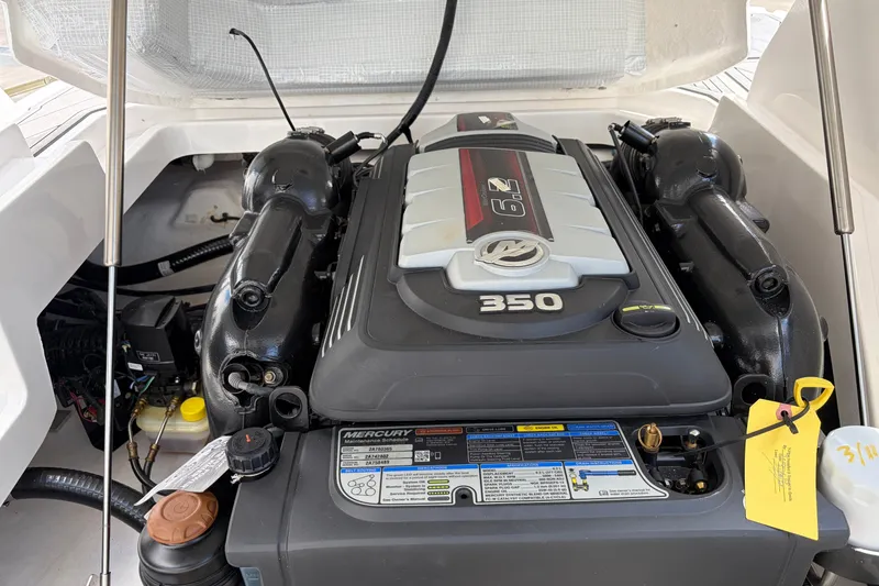 Slide: The Image of Engine compartment of a 2023 Monterey 258SS Super Sport boat, featuring a Mercury 350 engine. - 5
