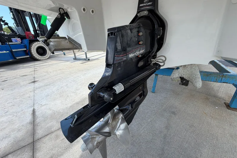 Slide: The Image of 2023 Monterey 258SS Super Sport boat with MerCruiser engine and propeller detail. - 3