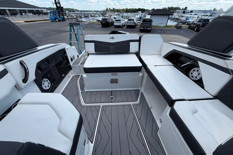 Slide: The Image of 2023 Monterey 258SS Super Sport boat interior with sleek seating and modern design. - 10