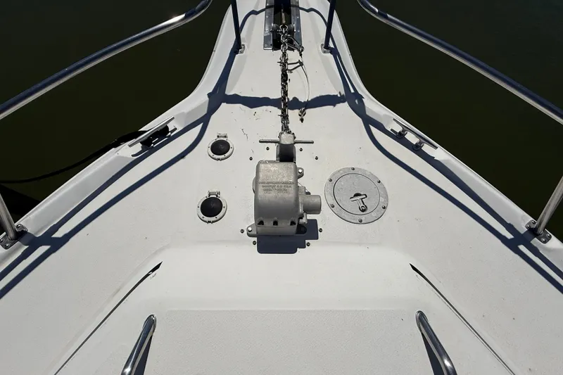 Slide: The Image of Bow of 1996 Sea Ray 400 Express Cruiser with anchor chain and deck fittings. - 5