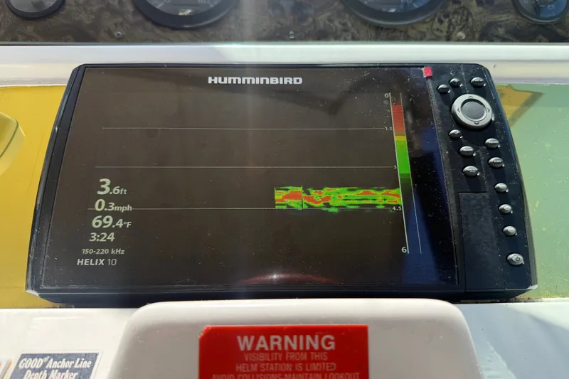 Slide: The Image of Humminbird Helix 10 fish finder on 1996 Sea Ray 400 Express Cruiser dashboard. - 22