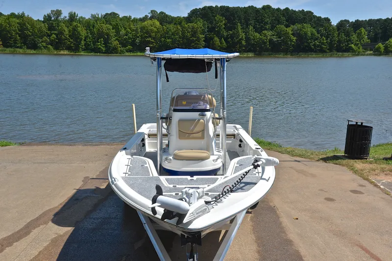 Slide: The Image of 2019 NauticStar 215 XTS Shallow Bay boat at lakeside launch ramp. - 17