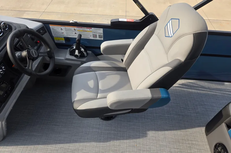 Slide: The Image of The interior of a 2027 South Bay SS224UL3.0 features a modern captain's chair and helm console. - 9