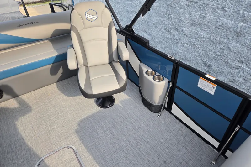Slide: The Image of Interior of a 2027 South Bay SS224UL3.0 with a gray seat and blue accents. - 7