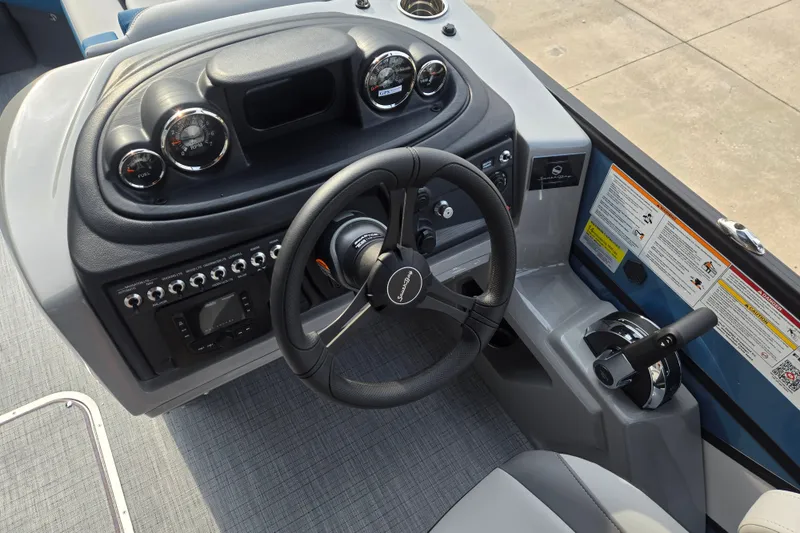 Slide: The Image of The image shows the helm of a South Bay SS224UL3.0 boat with modern instruments. - 10