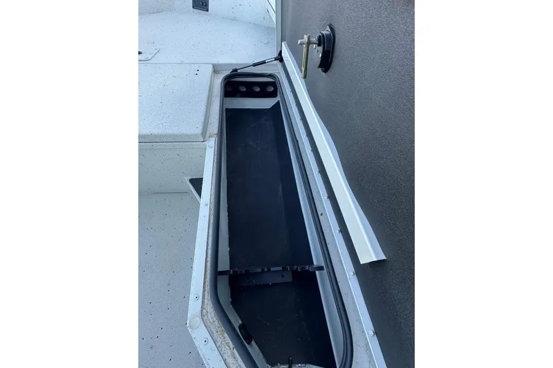 Slide: The Image of 2024 Ranger RB190 Bay boat storage compartment detail. - 20