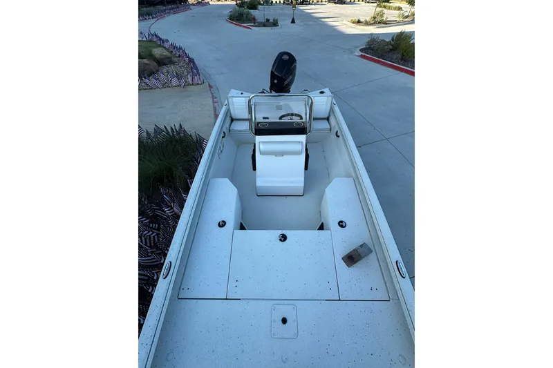 Slide: The Image of 2024 Ranger RB190 Bay boat interior with steering console and seating. - 11