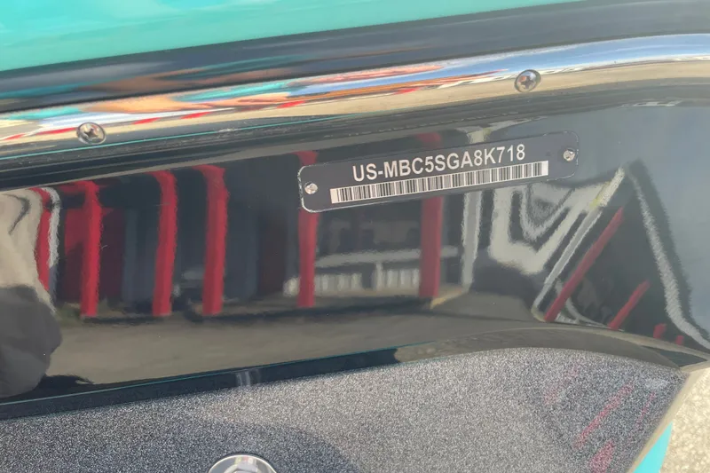 Slide: The Image of 2018 MasterCraft XT23 boat with visible hull identification number. - 20