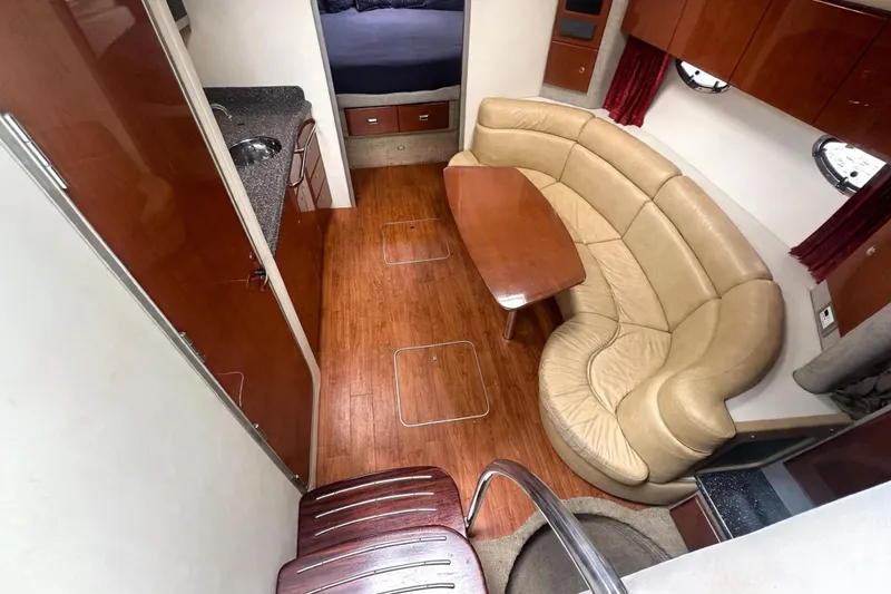 Slide: The Image of Interior of 2008 Formula 37 Performance Cruiser with leather seating and wooden finishes. - 9