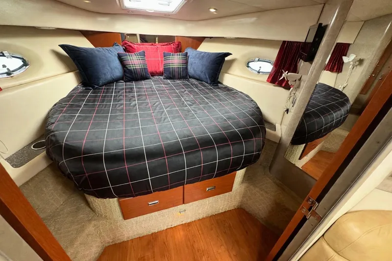 Slide: The Image of Luxurious cabin interior of a 2008 Formula 37 Performance Cruiser with stylish bedding. - 13