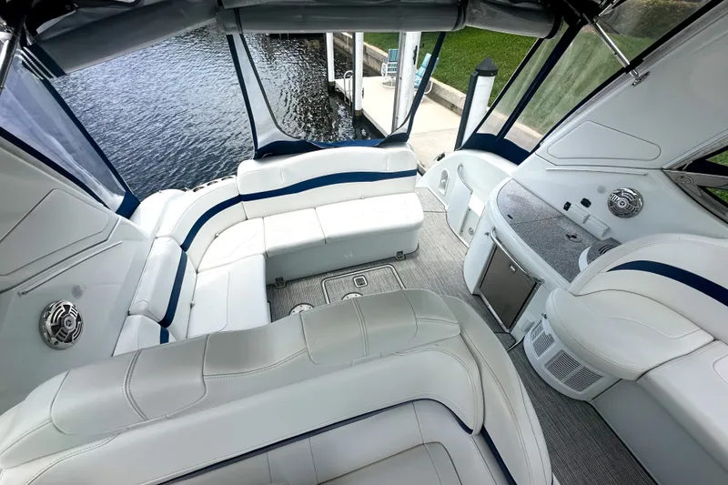 Slide: The Image of 2008 Formula 37 Performance Cruiser interior with white seating and modern amenities. - 6