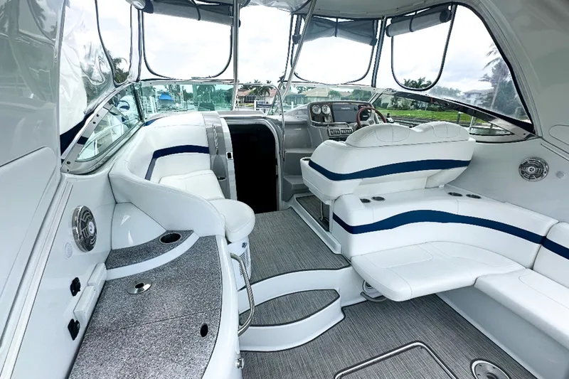 Slide: The Image of 2008 Formula 37 Performance Cruiser interior with white seating and modern dashboard. - 5