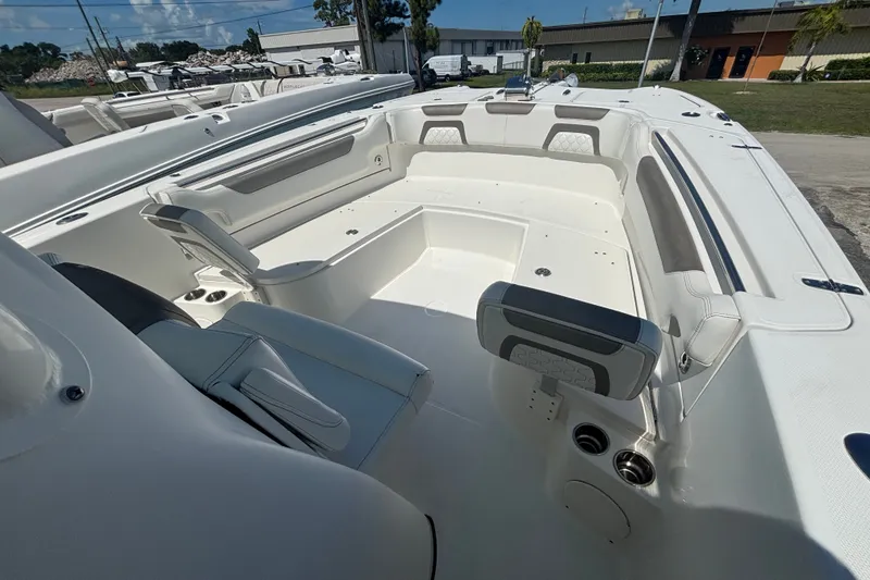 Slide: The Image of 2021 World Cat 295 CC boat interior with spacious seating and modern design. - 21