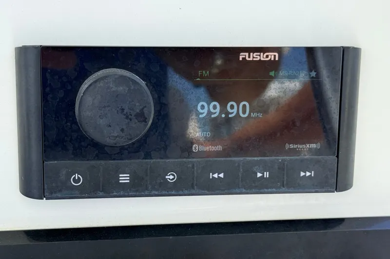 Slide: The Image of Fusion marine stereo display on Pair Customs 24 Center Console DV, 2023 model. - 9