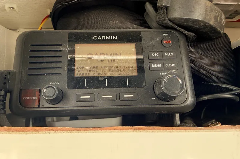 Slide: The Image of Garmin marine radio on 2023 Pair Customs 24 Center Console DV boat. - 8