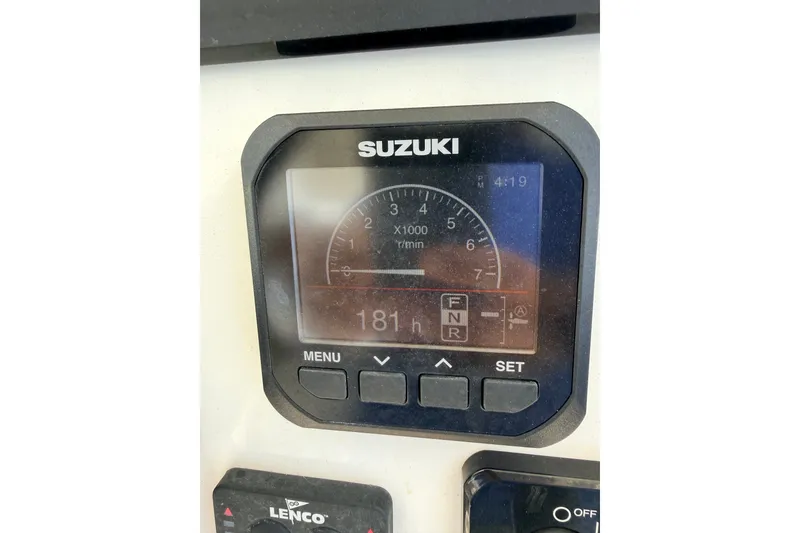 Slide: The Image of Suzuki engine display on 2023 Pair Customs 24 Center Console DV boat. - 12