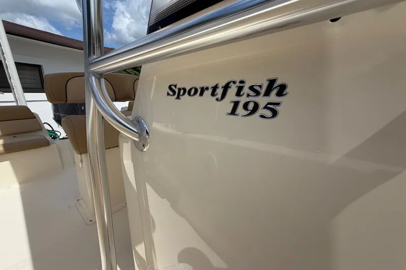 Slide: The Image of 2017 Scout 195 Sportfish boat interior with seating and railing. - 19