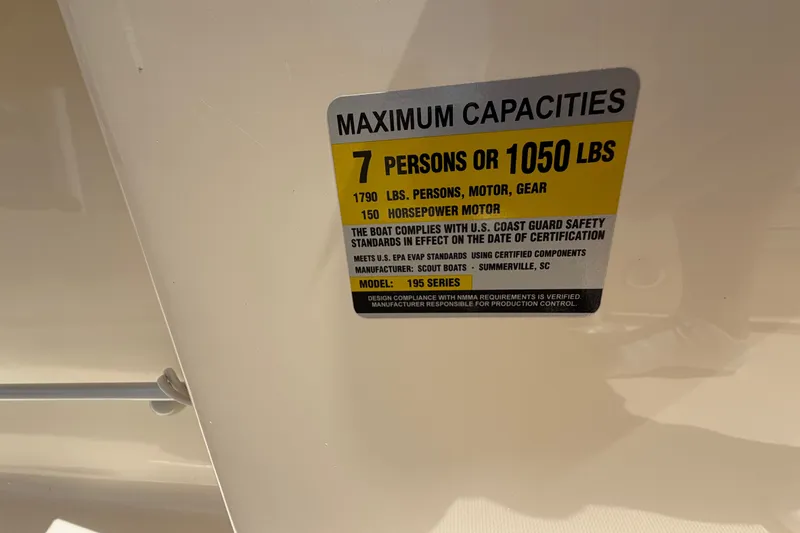 Slide: The Image of Capacity label on 2017 Scout 195 Sportfish, 7 persons or 1050 lbs, 150 horsepower motor. - 28