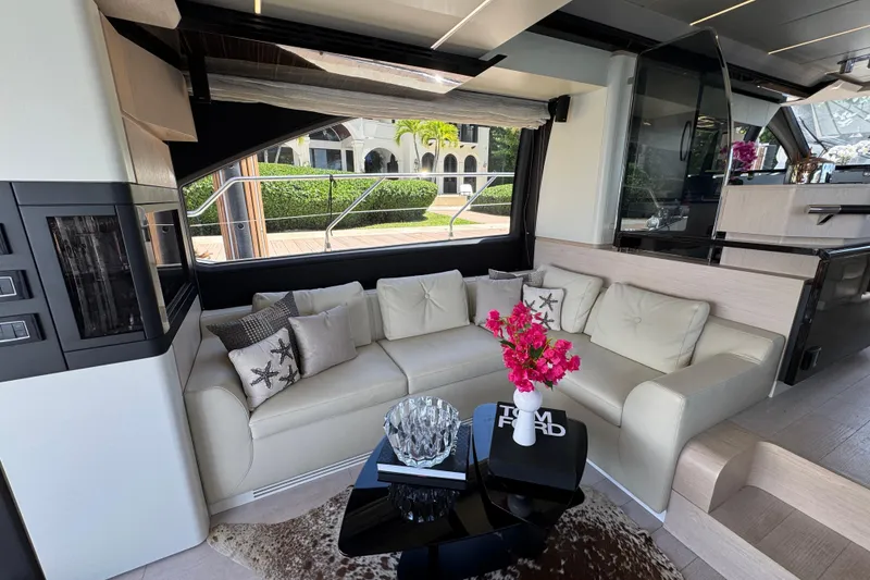 Slide: The Image of Luxurious interior of 2018 Azimut 66 Flybridge yacht with elegant seating and decor. - 20