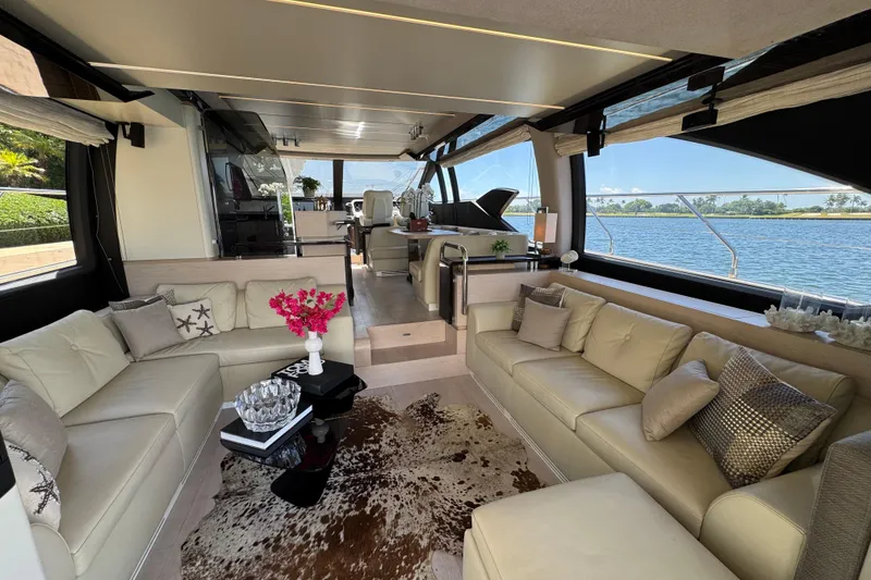 Slide: The Image of Luxurious interior of 2018 Azimut 66 Flybridge yacht with elegant seating and scenic views. - 23