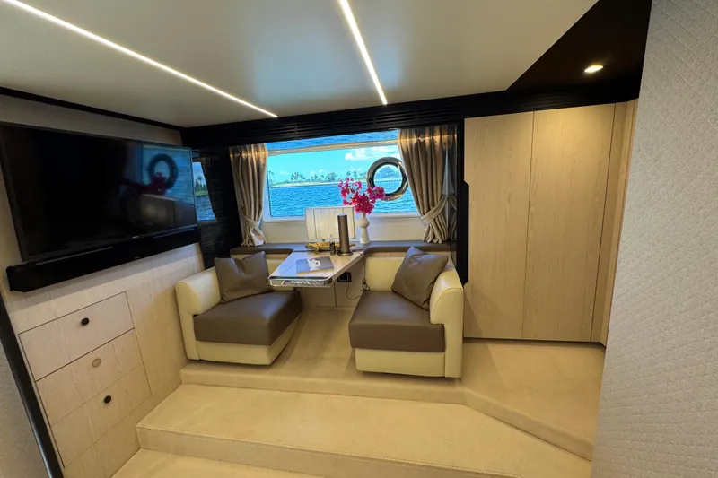 Slide: The Image of Luxurious interior of 2018 Azimut 66 Flybridge yacht with elegant seating and ocean view. - 31