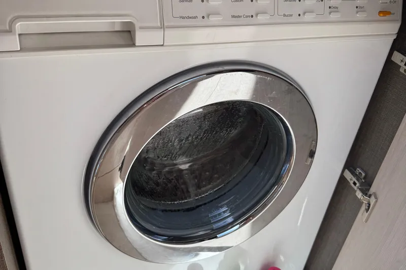 Slide: The Image of Front-loading washing machine inside 2018 Azimut 66 Flybridge yacht. - 47