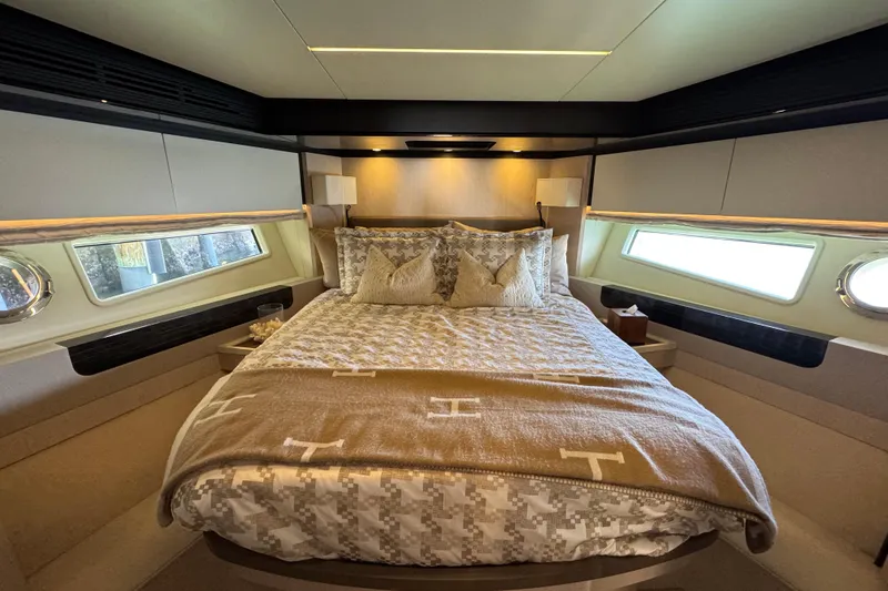 Slide: The Image of Luxurious bedroom interior of 2018 Azimut 66 Flybridge yacht with elegant bedding and modern design. - 38
