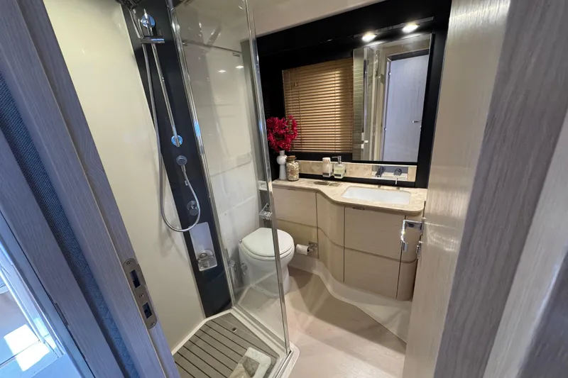 Slide: The Image of Luxurious bathroom in 2018 Azimut 66 Flybridge yacht with modern fixtures and elegant design. - 41