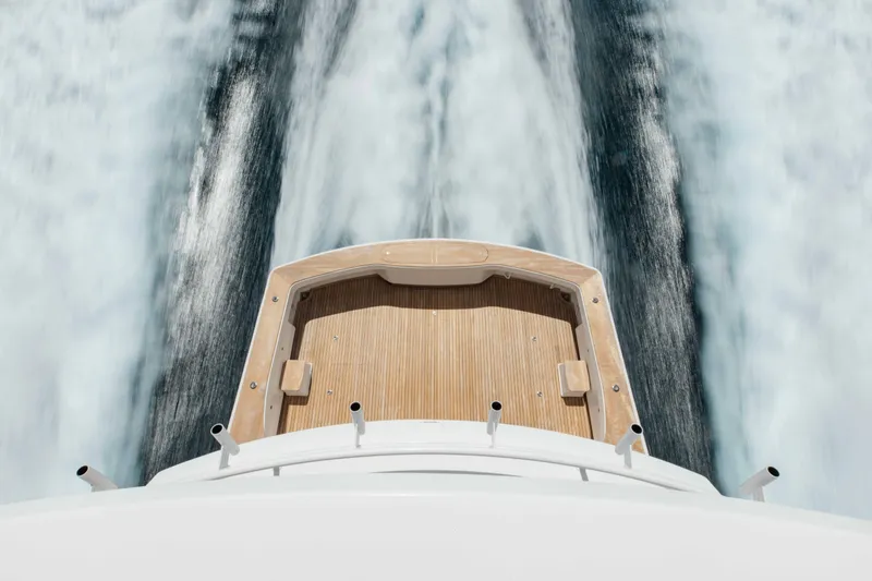 Slide: The Image of Aerial view of 2012 Viking 76 Enclosed Bridge yacht cruising at sea. - 20