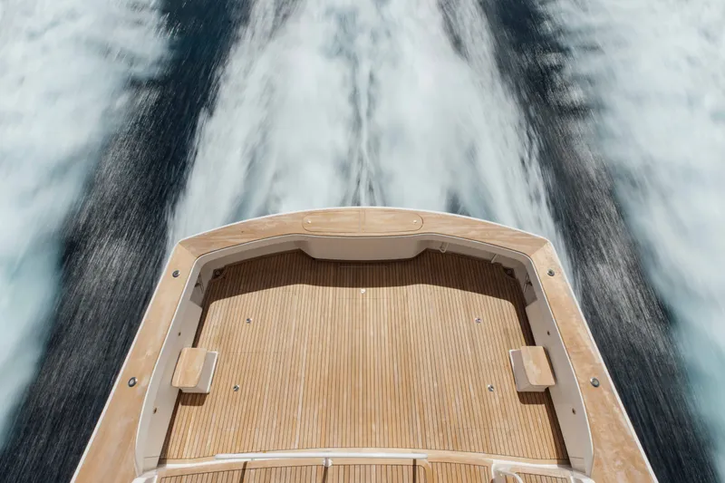 Slide: The Image of Aerial view of 2012 Viking 76 Enclosed Bridge yacht deck cruising at sea. - 21