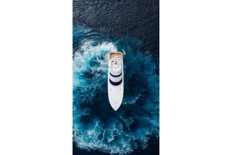 Slide: The Image of Aerial view of 2012 Viking 76 Enclosed Bridge yacht on deep blue ocean. - 17