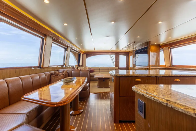 Slide: The Image of Luxurious interior of 2012 Viking 76 Enclosed Bridge yacht with elegant wood finishes. - 73