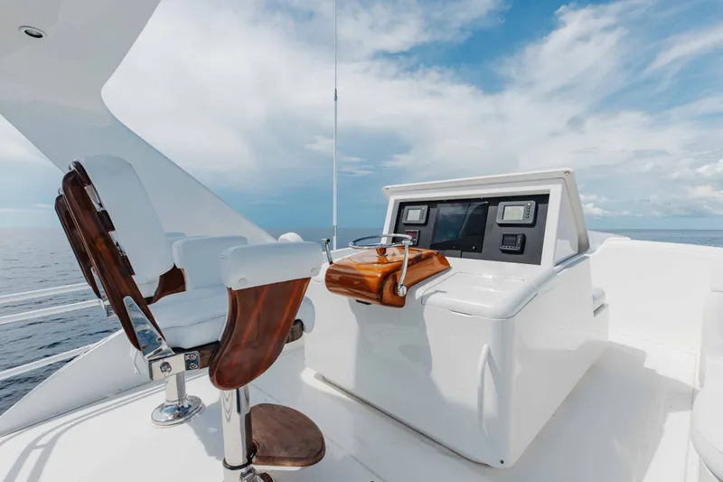 Slide: The Image of Cockpit of 2012 Viking 76 Enclosed Bridge yacht with ocean view. - 46