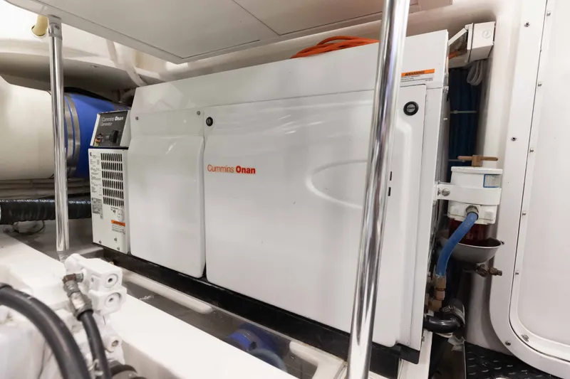 Slide: The Image of Cummins Onan generator in 2012 Viking 76 Enclosed Bridge yacht engine room. - 115