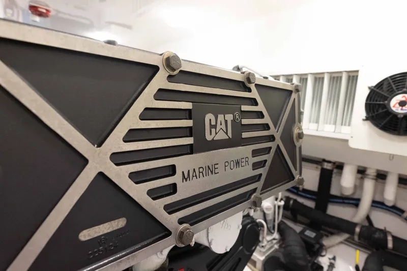 Slide: The Image of Engine room of 2012 Viking 76 Enclosed Bridge with CAT Marine Power component. - 110
