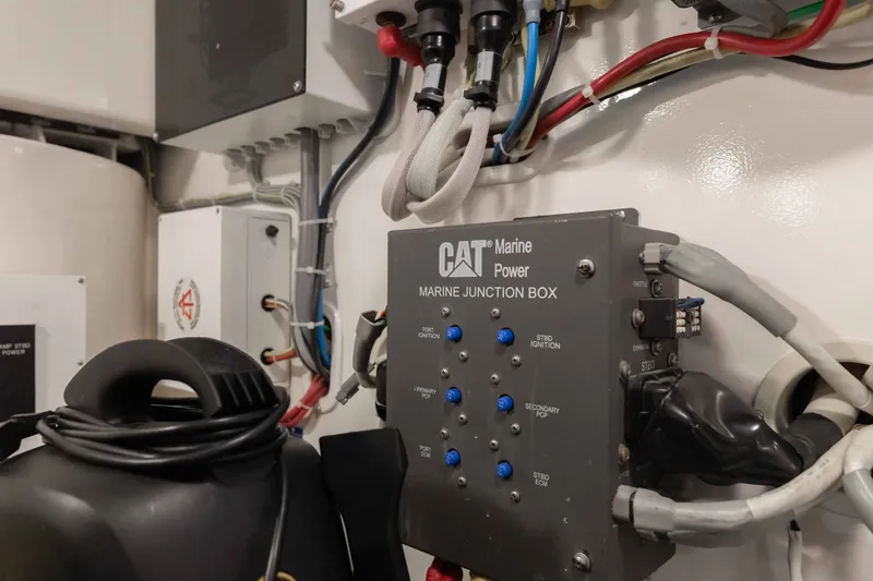 Slide: The Image of CAT Marine Power junction box in a 2012 Viking 76 Enclosed Bridge yacht engine room. - 121