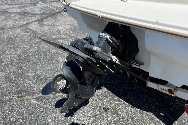 Slide: The Image of Propeller and stern of 2000 Sea Ray 180 Bow Rider boat on pavement. - 7